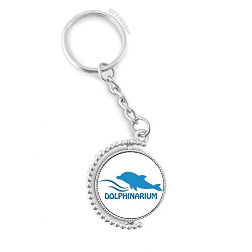 Llavero de delfín azul giratorio para decorar mochilas y llaves de casa