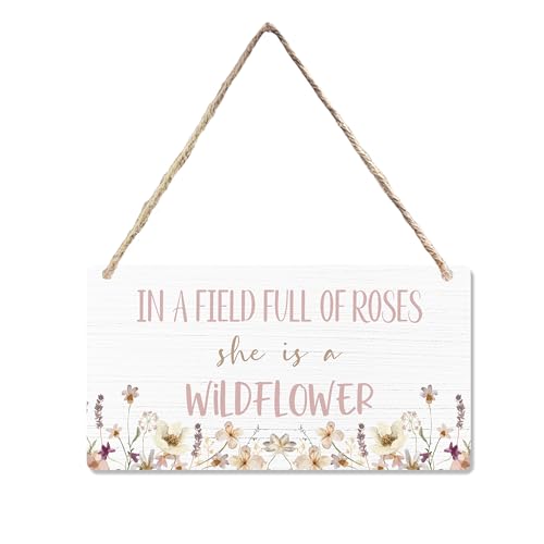 Image of CGBHW In a Field of Roses She is a Wildflower Wooden Sign, Pink Floral Baby Girl Nursery Girls Room Hanging Sign Wall Decor, Girls Bedroom Toddler Baby Kids Little Girl Room Door Decor 12 x 6 Inch