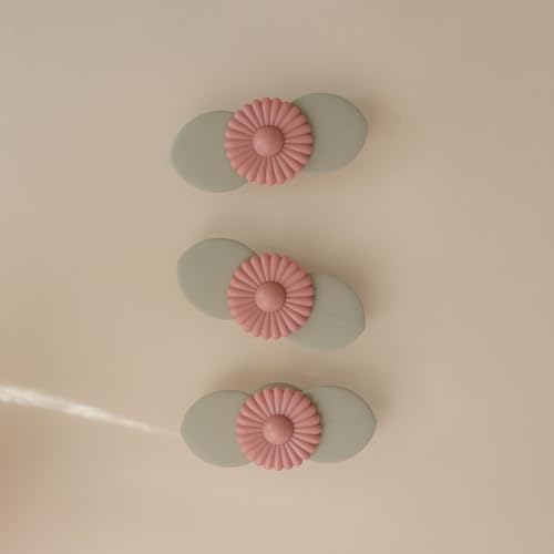 Image of mushie Blossom Suction Spinner Toy | Toddler Sensory Toys for Bath & Play