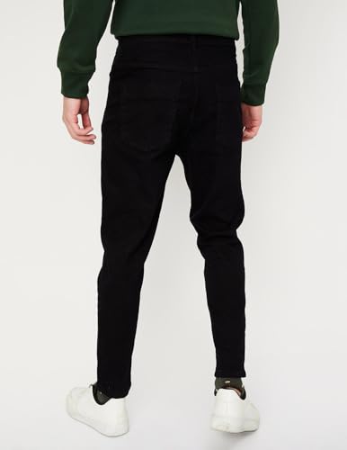 Image of Max Men's Carrot Fit Solid Cotton Blend Jeans
