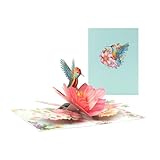 Realizzato con carta, questo biglietto presenta un design creativo che mette in mostra l'albero delle farfalle in un effetto ipnotizzante quando viene aperto