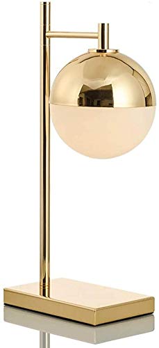Lampe de table ronde dorée pour illuminer vos soirées lecture dans la chambre ou le salon