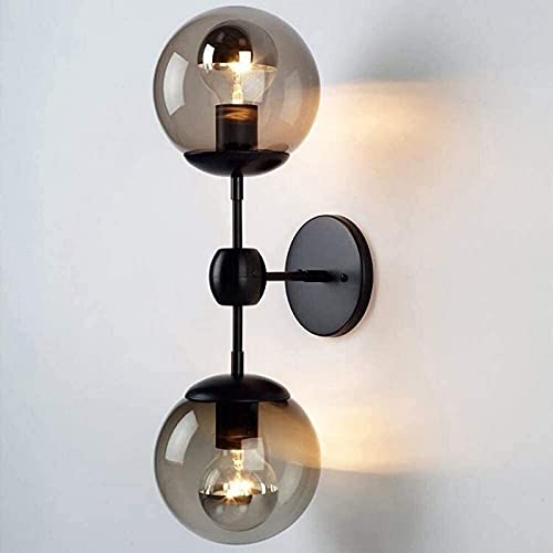 Aplique de pared industrial con doble linterna de vidrio para iluminar el baño sin sombras