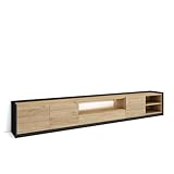 Module TV avec niche et porte battante. Charnières avec fermeture soft. Dimensions du module: 104 cm. de largeur, 50 cm. de hauteur, 37 cm. de profondeur. Couleur chêne et noir avec un veinage du bois poreux au touché de haute qualité.