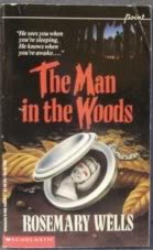 Paperback The Man in the Woods Book