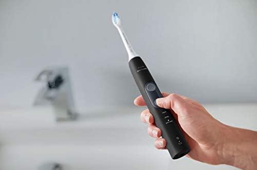 Philips Sonicare ProtectiveClean 5300 Rechargeable Electric Toothbrush, with Pressure Sensor, 3 Cleaning Modes, SmarTimer and QuadPacer, with 2 Bonus Brush Heads, Travel Case, Black, Model HX6423/34 - 1