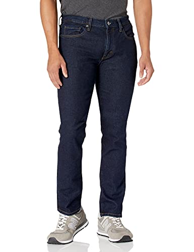 Amazon Essentials - Jean elástico ajustado para hombre, Azul (Rinse), 34W / 34L