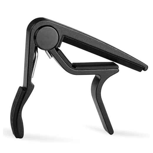 WiNGO Cejilla Guitarra Española Clásica Profesional Clasica Guitar Capo con 5 Púas, Negro.