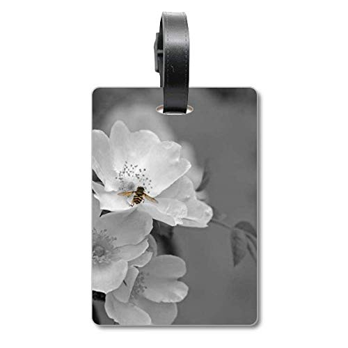 Étiquette valise voyage fleurs noir blanc pour vos vacances de rêve