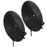 Ambiance musicale : des disques décoratifs pour une fête évoquent des souvenirs de morceaux classiques, mêlant déco vinyle rétro et décoration de chambre d'artiste pour une atmosphère vivante et chaleureuse. décoration vintage avec faux disques