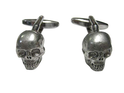 Mancuernas plateadas texturizadas con calavera miniatura 1
