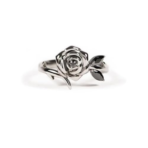 Anillo de rosa negra florece desde la oscuridad como símbolo de amor propio
