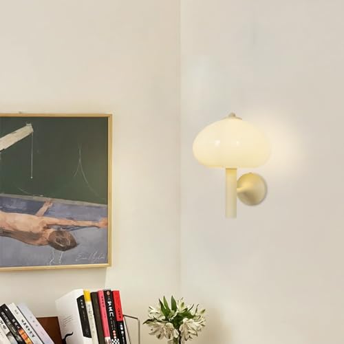 Accesorio de iluminación de pared de metal y vidrio con un sofisticado acabado amarillo crema 3