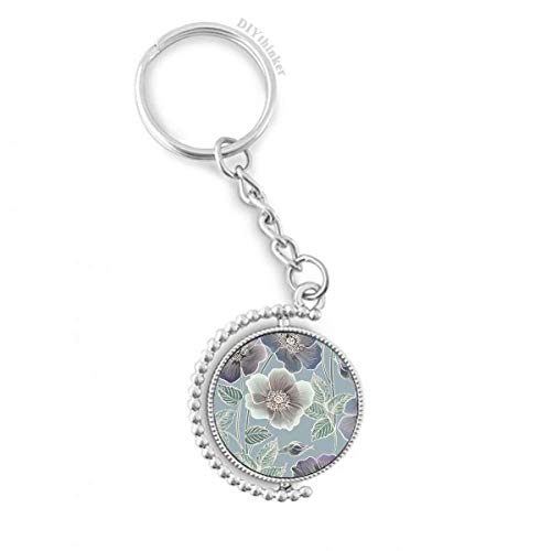 Llavero giratorio con cadena y diseño artístico de flor botánica en tono gris