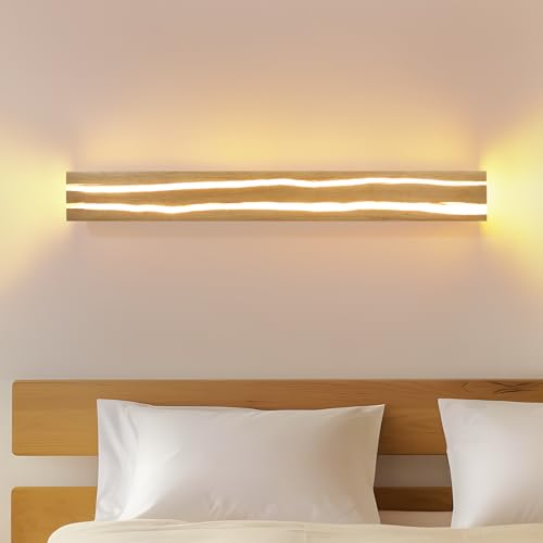 Originalità e raffinatezza: le applique in legno craquelé presentano texture e forme uniche. Ogni crepa è un'opera d'arte a sé stante, che conferisce agli interni un carattere visivo distintivo e un'atmosfera artistica. Come illuminazione decorativa, svolgono anche la loro funzione di illuminazione classica, diffondendo una luce adeguata e creando magnifici giochi di ombre e luci grazie alla luce filtrata dalle crepe