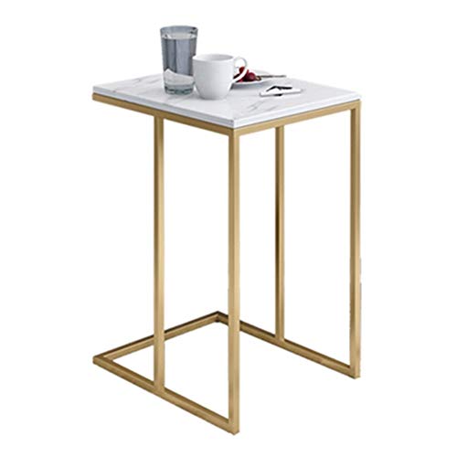 Table basse et d'appoint dorée pour optimiser le rangement du salon