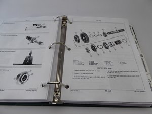 Manual page with an exploded view diagram of mechanical components