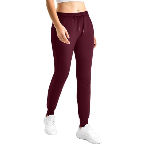 Image of CADITEX Womens Joggers with Pockets,Stretch Active Drawstring Sweatpants Women for Travel Workout Running