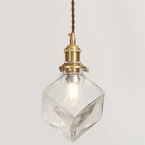 Suspension en verre réglable pour illuminer un hall d\'entrée sombre avec élégance zen