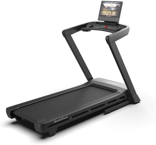Horizon T101 treadmill with console and running deck on white background