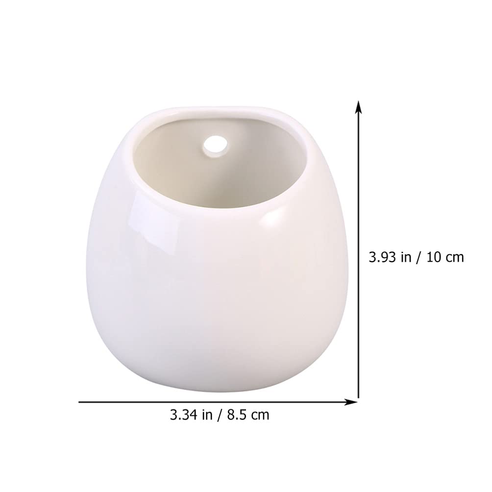 Białe ceramiczne doniczki ścienne, okrągłe wiszące uchwyty na rośliny, mini wazony ścienne do sukulentów, wewnętrzne donice cylindryczne, dekoracyjne dekoracje ścienne.