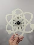 The Atomic Clock Glow in the Dark Wall Clock