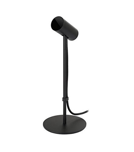 An Oculus tracking sensor on a desk, a cylindrical device on a stand with a cable.