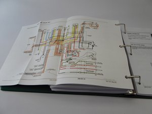 Manual page displaying a detailed wiring diagram for the tractor