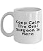 MB10 PROUD GIFTS Keep Calm. The Oral Surgeon Is Here. 11oz 15oz Mug, Oral surgeon Present From Colleagues, Fancy Cup For Colleagues, Dental health, Toothbrush, Toothpaste, Floss, Mouthwash