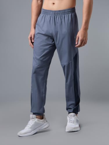 Image of TECHNOSPORT Men's Regular Fit Joggers with Zip Pockets, TECHNOLITE Quick Dry Stretchable Lightweight Track Pants for Gym Running and Casual Wear