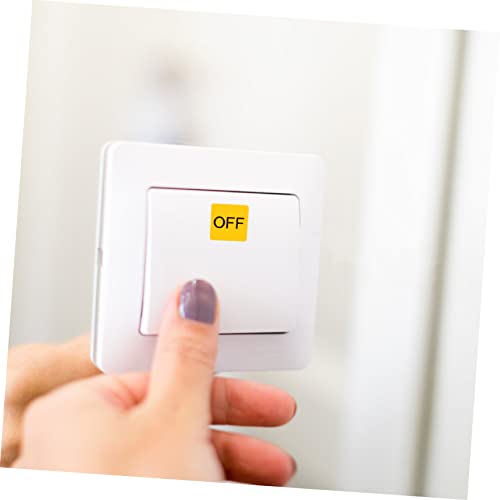 Etiquetas de seguridad on/off amarillas: la solución práctica para los interruptores del dormitorio 7