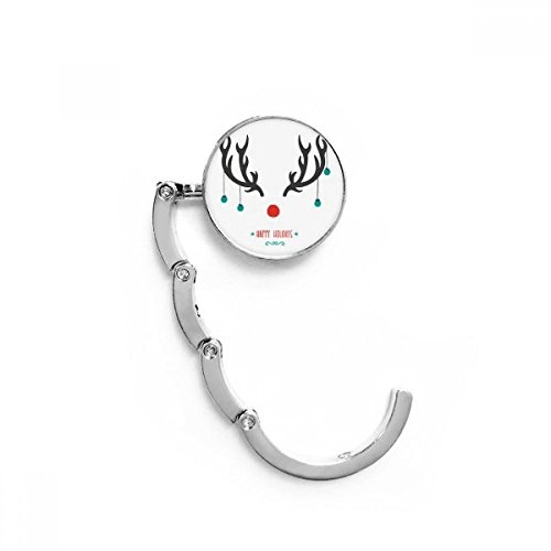 Evita que tu bolso toque el suelo con este gancho plegable de mesa navideño