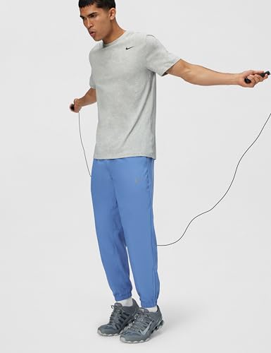 Image of Nike Men's Form Dri-FIT Tapered Versatile Pants