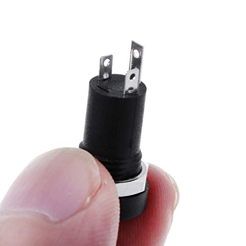 DAVITU PJ-392A 3.5MM Audio Jack Socket held by fingers, showing its compact size
