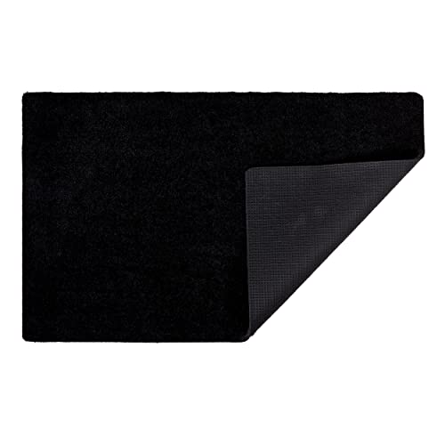 Tapis de propreté pour éliminer les traces de pas dans l'entrée