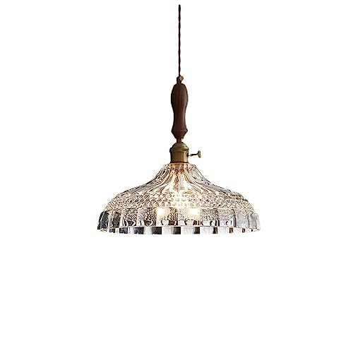 Lámparas colgantes de vidrio claro para iluminar mesas de comedor y cocinas modernas