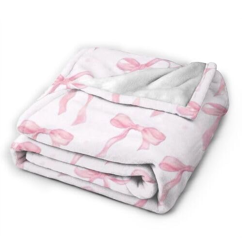 Couverture douillette en flanelle rose pour vos soirées canapé cosy