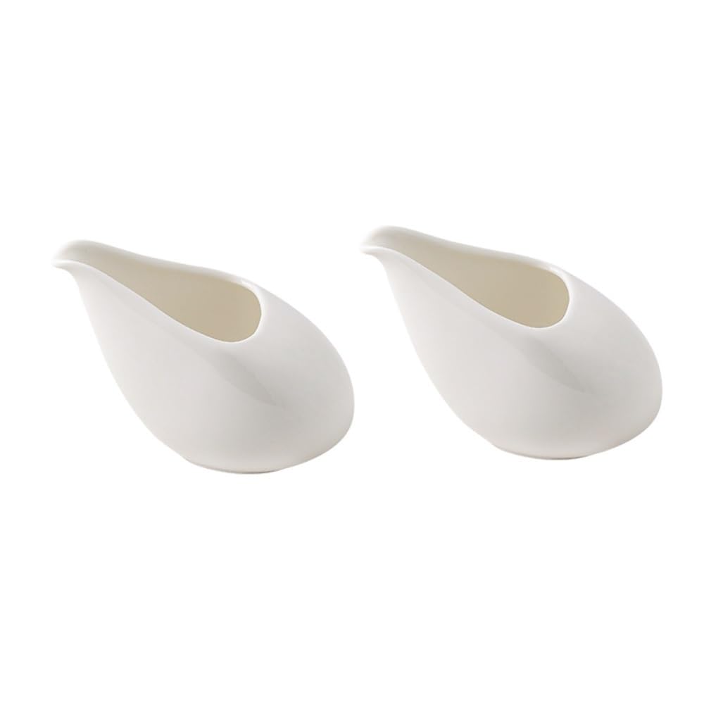Pichet à sauce en céramique blanche et sa cuillère au design épuré