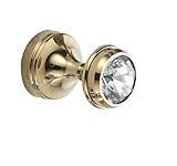 Mit Kristallkopf kleiner Hakenhaken, hängendes Handtuch an der Wand des Badezimmers hängend,...