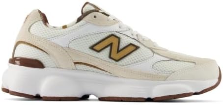New Balance Women's 603 Sneaker, Sea Salt/Breakfast Tea Metallic, 5 — view 2