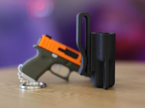 Image of Gun Shape Keychain for Men, Stylish Pistol Design Key Ring, Durable Plastic Key Holder for Car, Bike & Bags, Cool Trendy Keychain