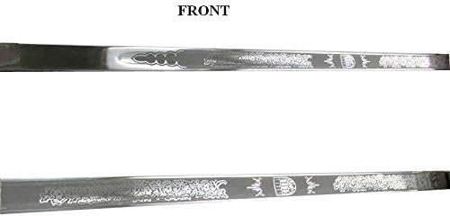 Close-up of the front side of the sword blade with etched designs.