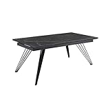 Son plateau en céramique pleine masse de 11mm noir marbré mat passe de 180 à 260 cm.