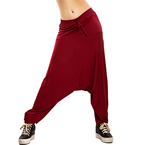 TAGLIA UNICA CON VITA ELASTICA: Pantaloni donna Toocool modello harem in taglia unica, pensati per una vestibilità ampia e comoda. La vita elastica con laccetto regolabile si adatta facilmente a diverse corporature, offrendo comfort e libertà di movimento. Ideali per tempo libero, viaggi e look casual rilassati.