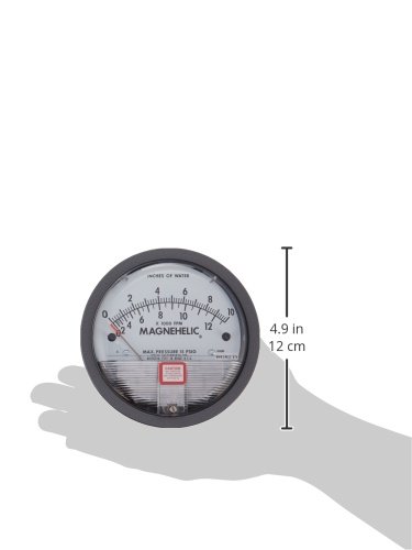 Dwyer Magnehelic Differential Pressure Gage 2010AV held in hand for scale
