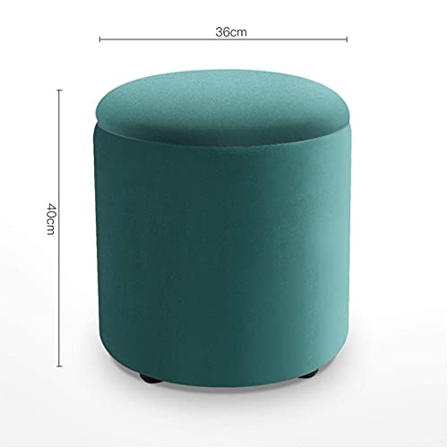 Pouf de rangement rond vert pour optimiser une petite entrée encombrée