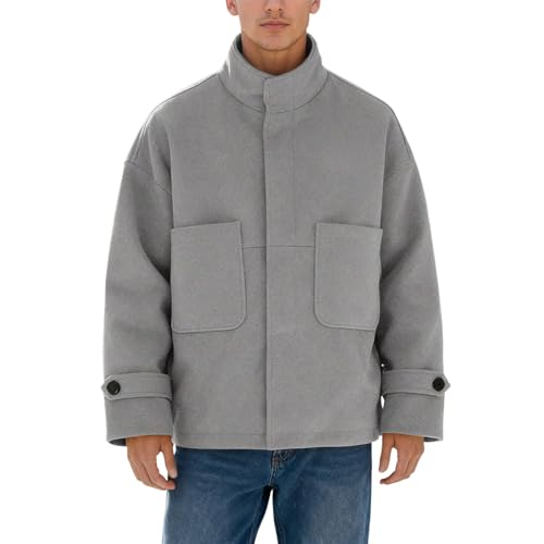 Coupe ajustée et col montant pour cette veste en laine moderne