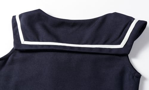 Vestido escolar de niña con cuello náutico y falda plisada con lazo 4