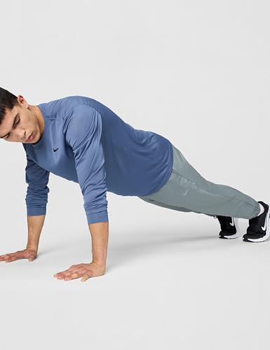 Image of Nike Men's Form Dri-FIT Tapered Versatile Pants