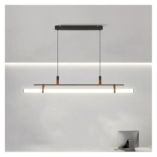 Table à manger nordique moderne illuminée par un lustre suspendu noir